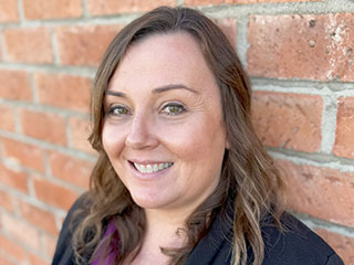 Jennifer Reno Magallanes Headshot